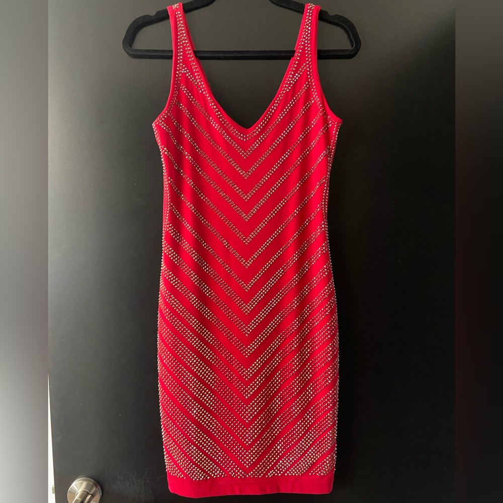 Sexy sparkle in beautiful red color. Mini dress!